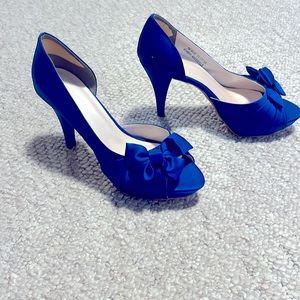 David’s Bridal never worn. Perfect condition for wedding or any formal occasion